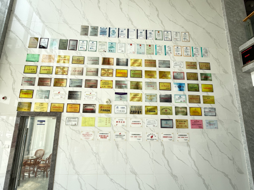 certifications wall at Leev Conveyor factory