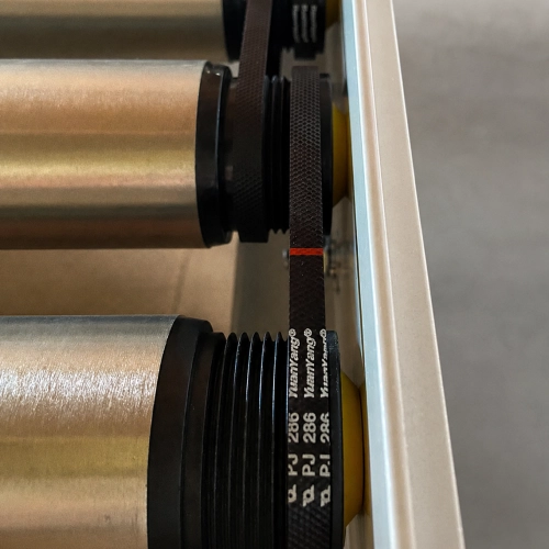 Poly-V drive detail used on tapered conveyor rollers for curve conveyor systems