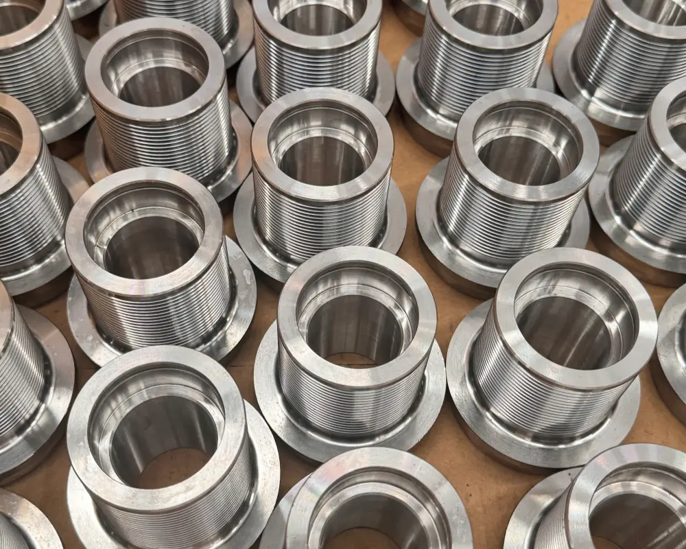 CNC-machined poly V (PJ) pulleys with turned grooves, batch produced before welding