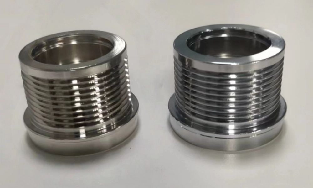 Two machined metal poly V pulleys with turned PJ grooves for conveyor rollers