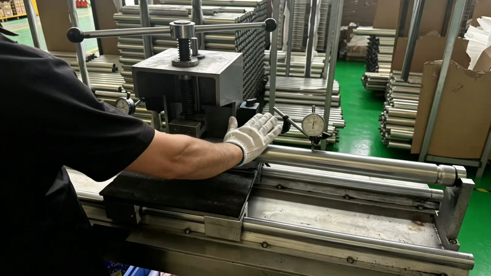 Runout checking grooved conveyor rollers before shipment
