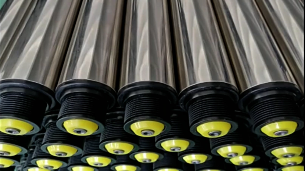 Injection-molded plastic poly V conveyor rollers with black PJ pulleys