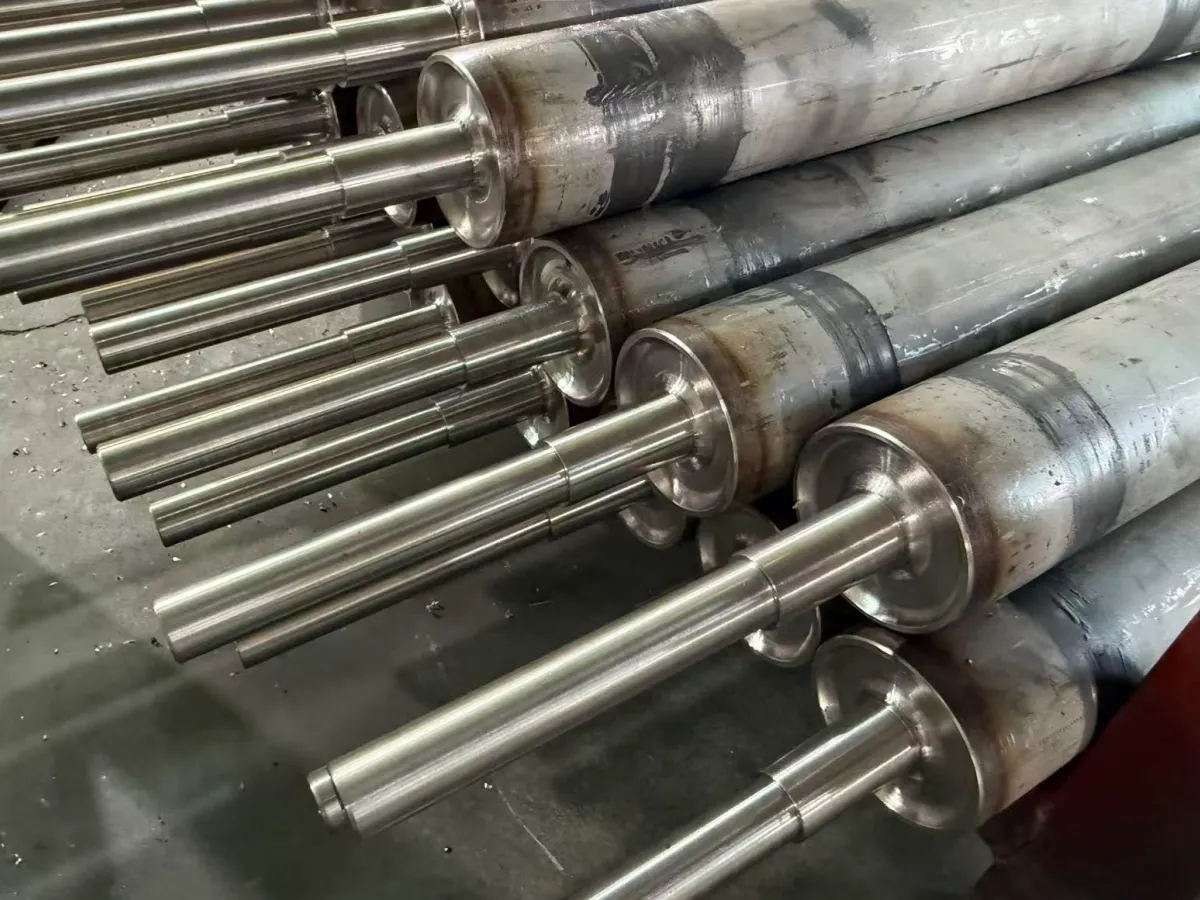 Long welded live-shaft roller assemblies in production with machined shaft journals