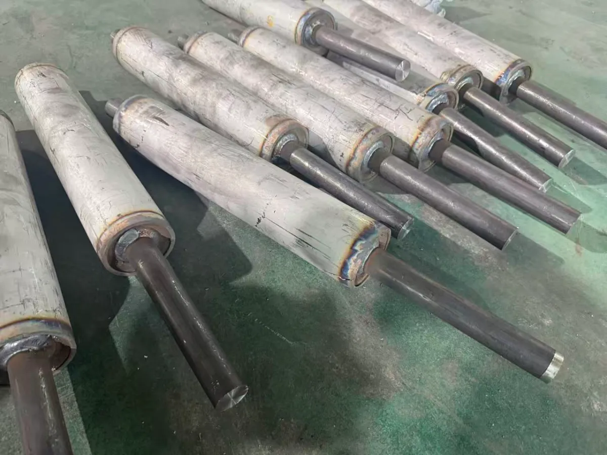 Welded live-shaft roller assemblies cooling naturally before final journal machining